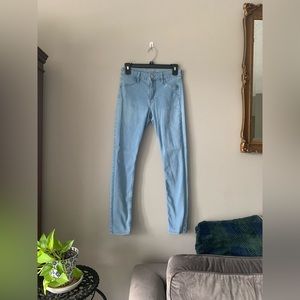 Size 4, light wash denim skinny jeans. Unknown brand, in perfect condition.